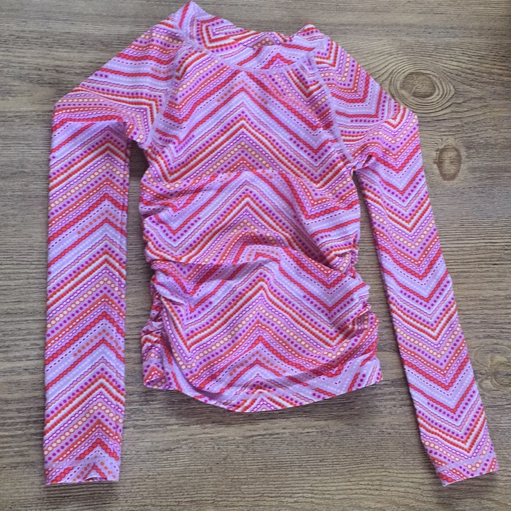 Like new Tucker and Tate swim shirt. Runs small